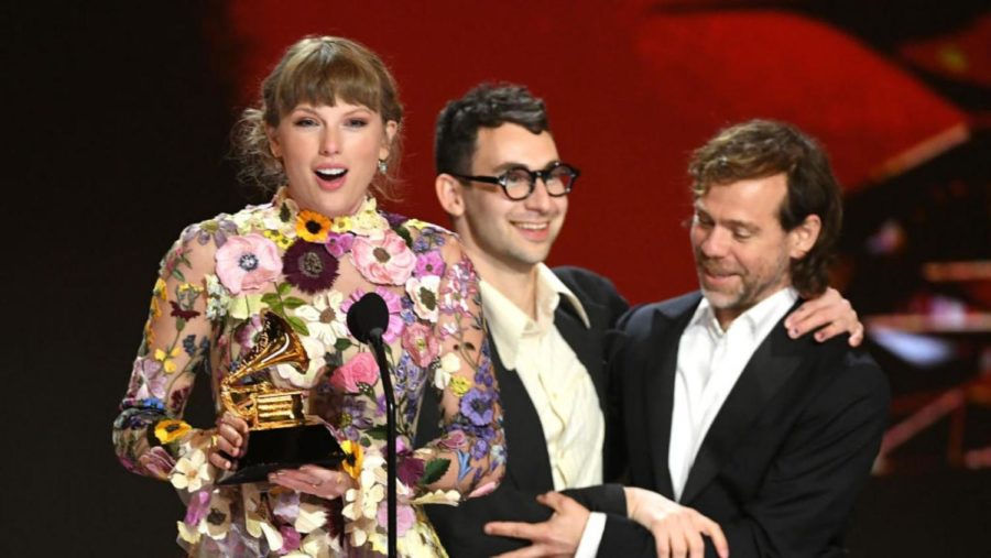 Accepting her “Album of the Year” award, Taylor Swift thanks her fans for all their support.