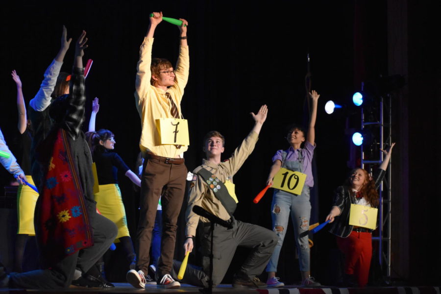 During the March 27 performance, senior Keith Pawlowski leads the song “Magic Foot” as the fellow cast members back him up. 