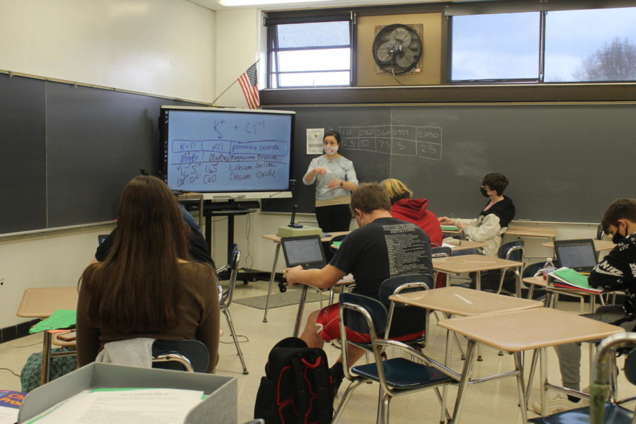 Chemistry teacher Debrah Evans uses her Smart Board to teach students about the
periodic table of elements.