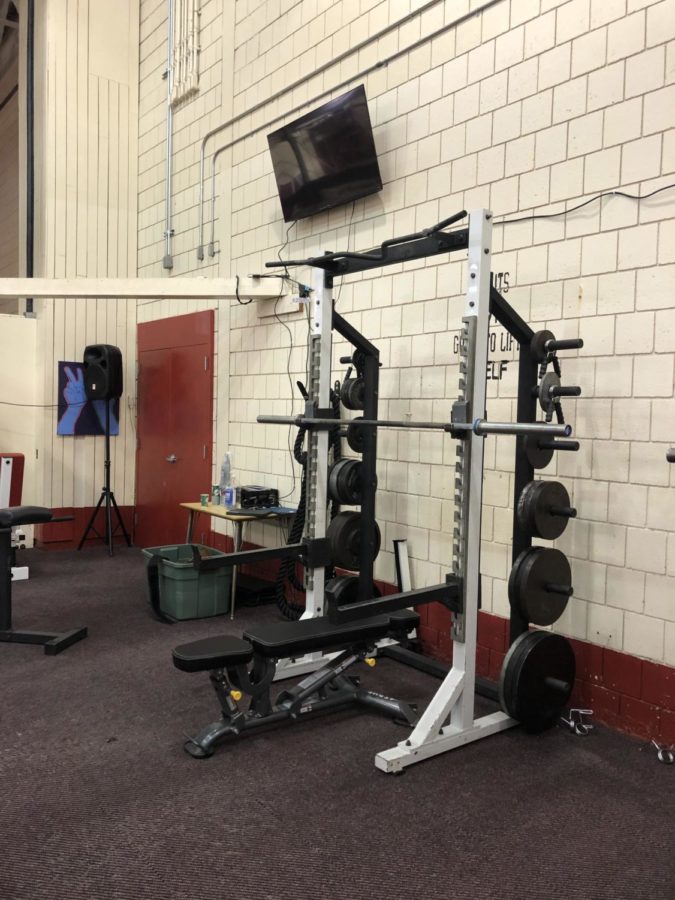 The+high+school+weight+room+received+many+new+upgrades%2C+including++total-body+resistance+benches+and+televisions.