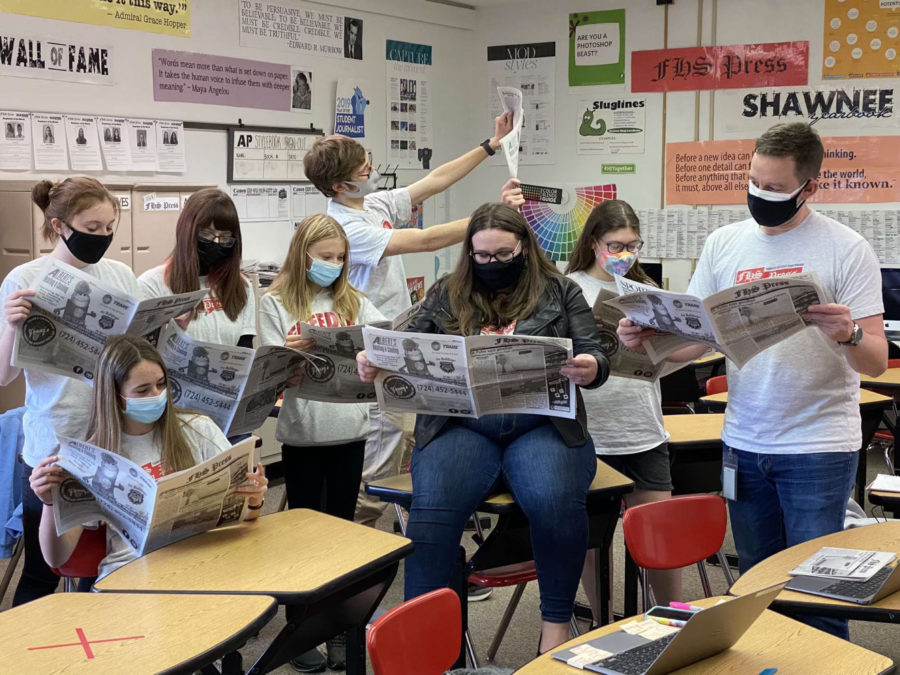 The FHS Press staff poses for a photo to promote the March edition of the publication
on March 26.