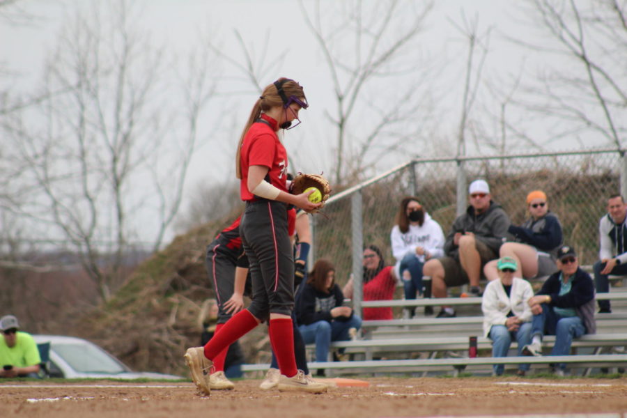 Stepping into the circle, sophomore Leyasa Young prepares to deliver a pitch in a game against Hopewell on March 27.