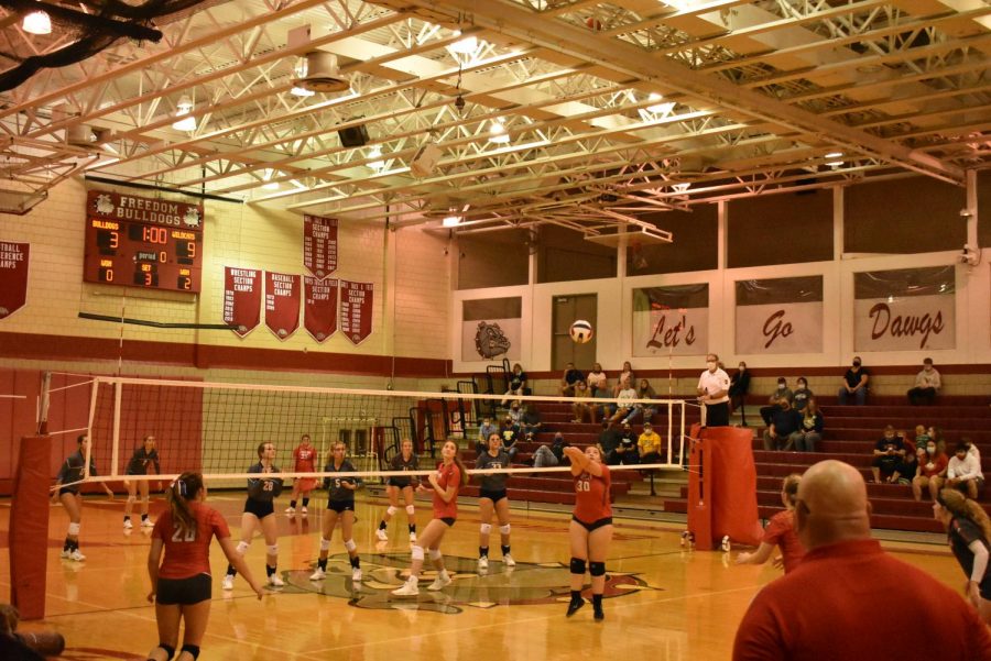 On Sept. 9, at a game against Shenango, senior Emily Frashure sets the ball into the air for the closest person to spike it over the net.