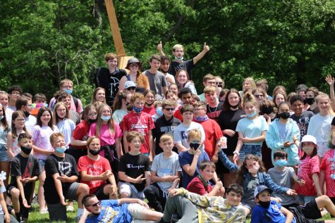 
Sixth grade students and Physics Club pose in front of the trebuchet in 2021. Last year, Physics Club had to reschedule the Fall Fest to later in the school year because of virtual schooling. 