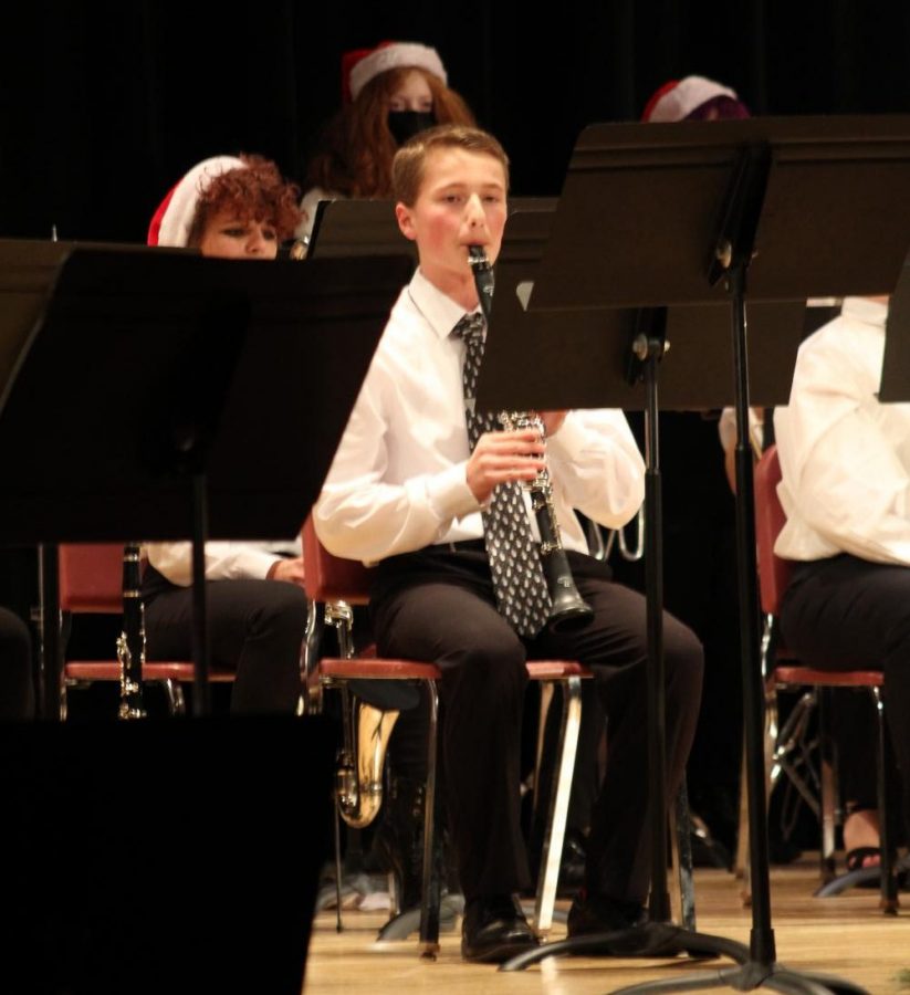 Freshman Joseph Castelli played the
clarinet for the high school concert band
during their holiday performance on Dec.
15.