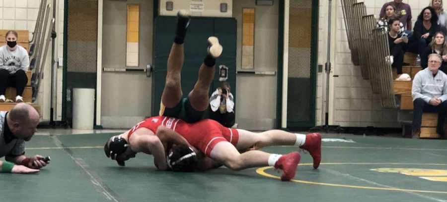 Holding down his opponent at Carlynton on Dec. 15, sophomore Cody Patterson goes
for a pin during his match.