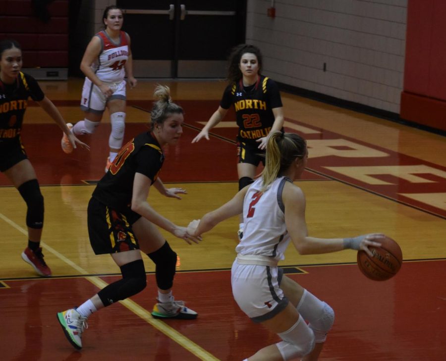 Dribbling+down+the+court%2C+sophomore+Shaye+Bailey+looks+to+score+against+North+Catholic+at+home+on+Jan.+20.
