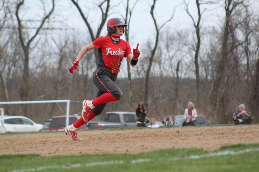Then-freshman Shaye Bailey runs from second to third base during a game against the Hopewell Vikings last season on March 27, 2021.