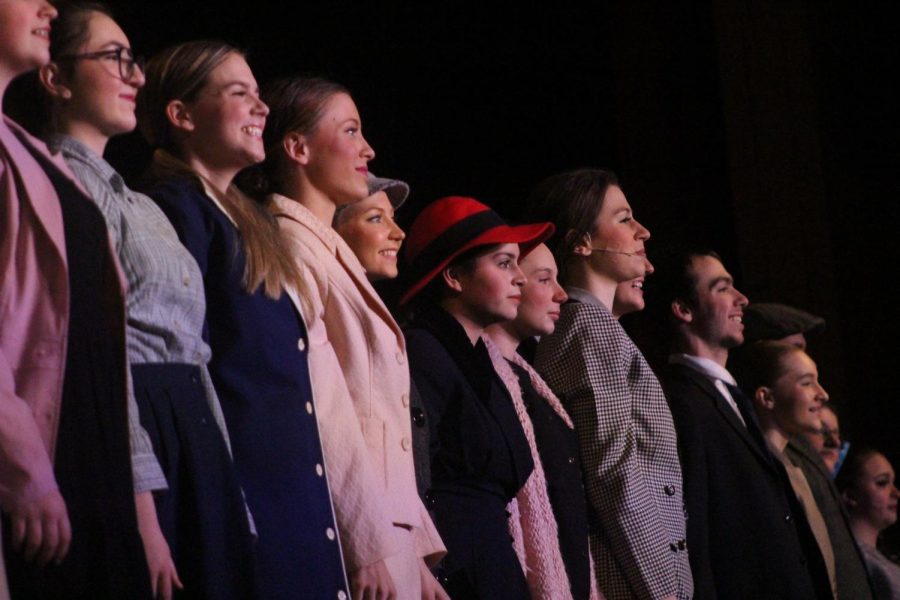 After performing “N.Y.C.” on March 5, “Annie” cast members hold a pose as the scene concludes.