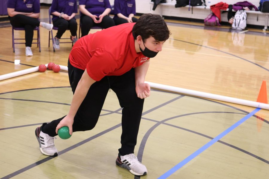 Going to release the ball, sophomore Wyatt Boyer tries to put points on the scoreboard for the Bulldogs during a match against Western Beaver on March 9.