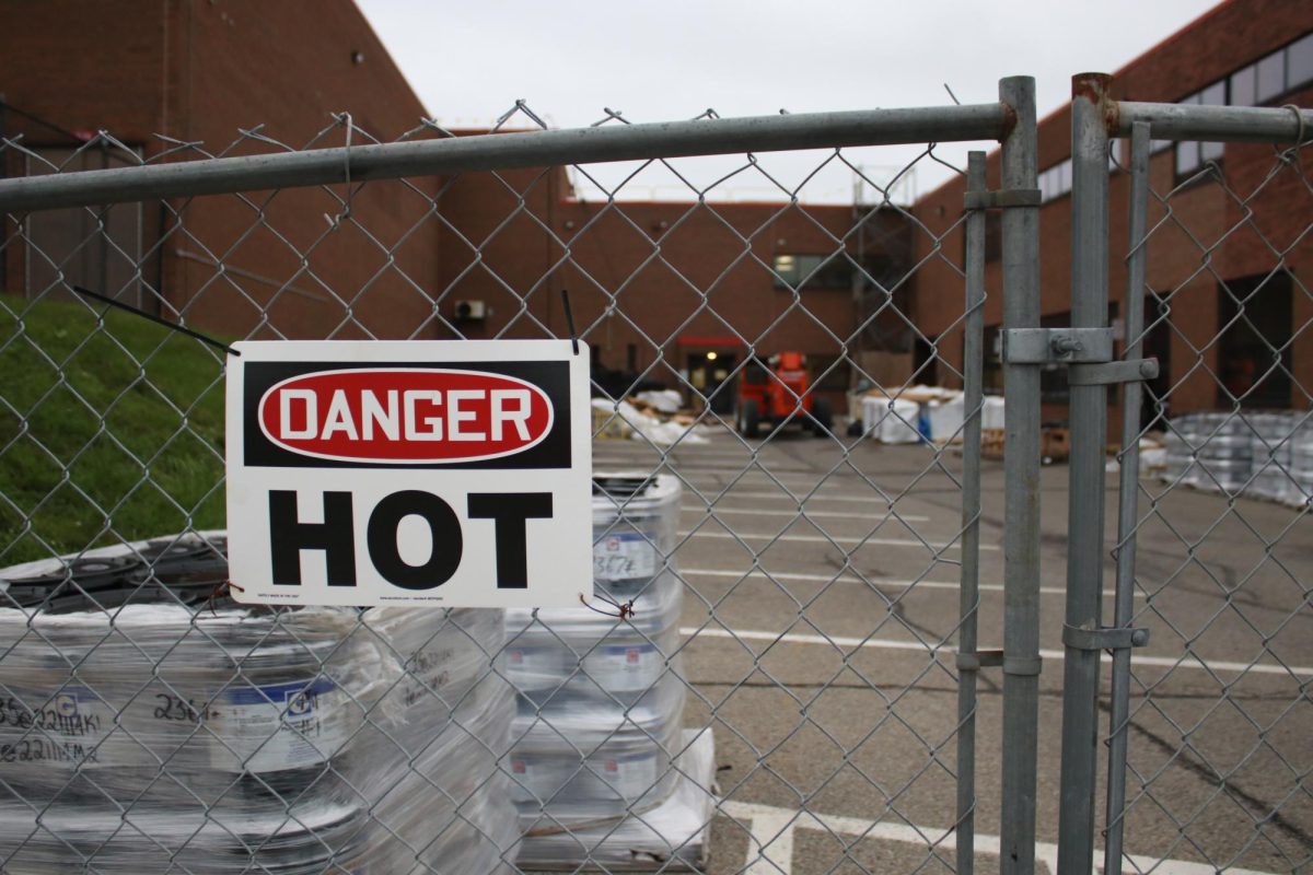 Safely gated: The cafeteria parking lot was gated off to protect students from possible injury with hot tar and other constuction hazards. Due to this, the Homecoming dance will be held in the gymnasium.
