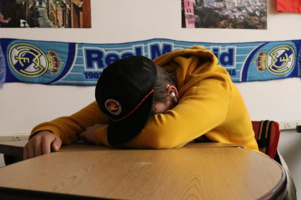 Sleepy after the socials: After a long night of staying up on social media, sophomore Garrett Drutarosky falls asleep in his PLT while working on schoolwork. Showing the effect that when you stay up on social media throughout the night it can cause someone to fall tired in class.
