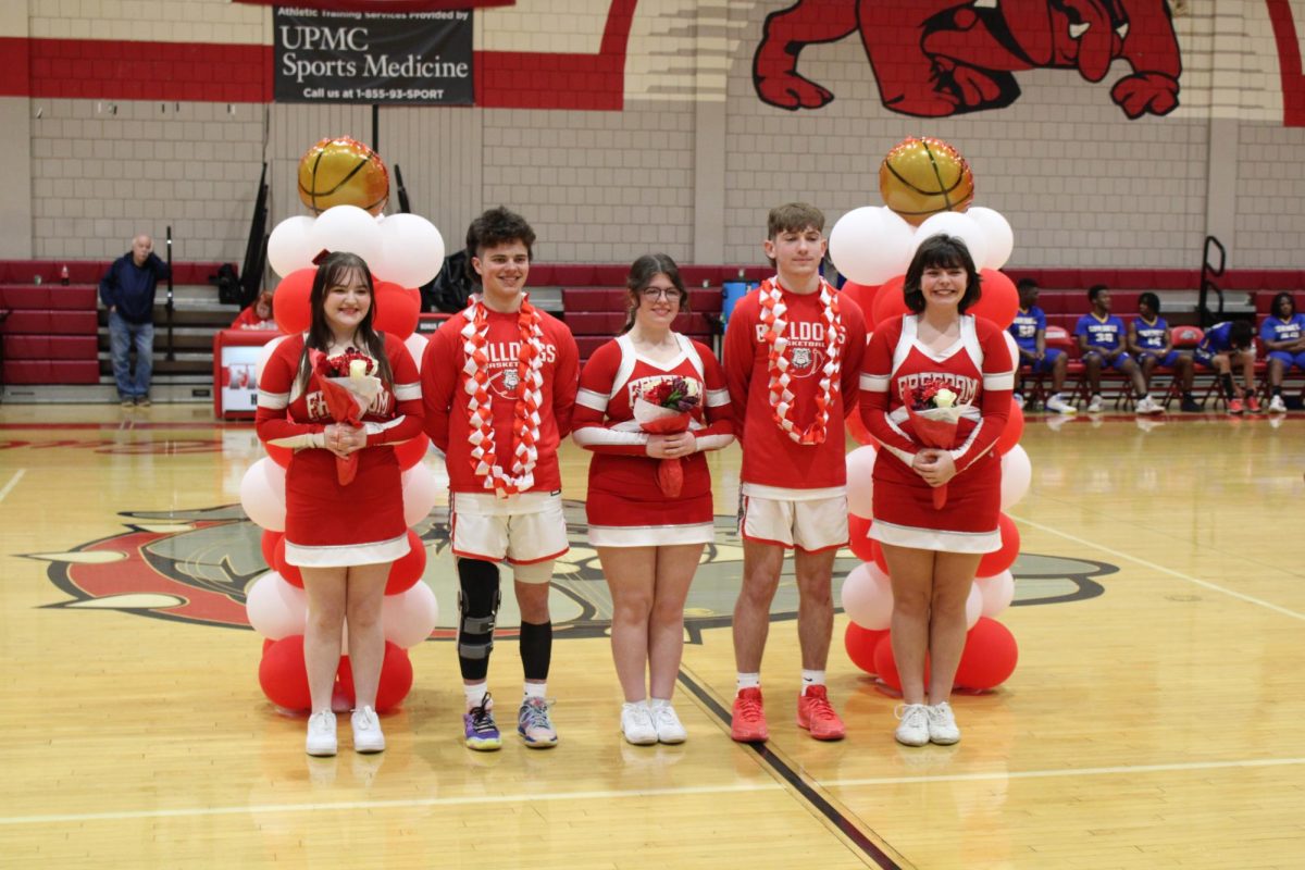 Finishing the season with only two wins was not the boys’ basketball teams plan heading into the season. Towards the end of the year, the team began to show flashes of success. Three seniors said their final goodbyes after the teams final game: Logan Bickerstaff, Jonathan Hartley and Cody Patterson. The team will be losing these three vital seniors who put forth so much effort for the team. Not only did the seniors put forth the effort on the court, they also served as mentors to the younger members of the team, allowing them to learn from the seniors and get a better understanding of the sport.
“I’ve experienced many things over my four years so I’ve learned what to do, what not to do, and things like that. The experience is the most important thing when it comes down to just trying to teach and lead the younger players,” senior captain Bickerstaff said.
With the season all wrapped up, the team looks for ways to grow. Reflecting on the past is one of the best ways to grow, so you can learn from your mistakes. Teams can reflect by watching film of the games to see first-hand what they did incorrectly, or what they could have done better. Another way is to practice repeatedly. Practice makes perfect, and it is one of the ways you can continuously improve your overall skills. 
“Practicing constantly helps me grow as a player. When I’m practicing, I work on shooting more than anything else. After practicing so often, you eventually become more consistent during the games,” junior Isaiah Leisha said. 
In their last four games, the team showed signs of uniformity. They fell to the Beaver Fall Tigers by a score of 68-35 on Feb. 2. In their next game on Feb. 6, they fell by a score of 42-39. In their last two games, they broke a lasting record in Freedom boys basketball. With a win on Feb. 9 against the New Brighton Lions, the Bulldogs won by a score of 42-30, and on Feb. 12, the Bulldogs picked up a win against Cornell by a score of 58-52. No team had won back-to-back games in 20 years.
The team had many struggles this year, but the future looks bright. With many younger players, the team should have no problem building a talented team in the future. 
