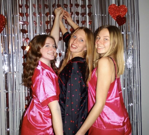 Giddy gals: At a Galentine’s Day party, senior Madison Meyer (right) posed with her friends for a picture. At this party, they played games and celebrated their friendship. 
