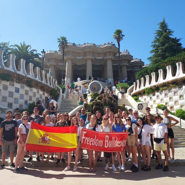 Happy in Spain: Posing for the camera, students who went on the last school international trip celebrate being in Spain. Students are excited and anticipating the upcoming 2025 trip.