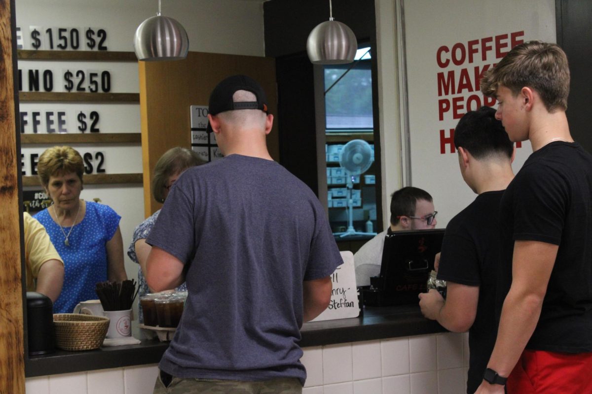 During PLT, on June 3, students stand around Cafe 116 waiting for and ordering their drinks. A portion of the profit that was received was given to ‘Alex’s Lemonade Stand’.