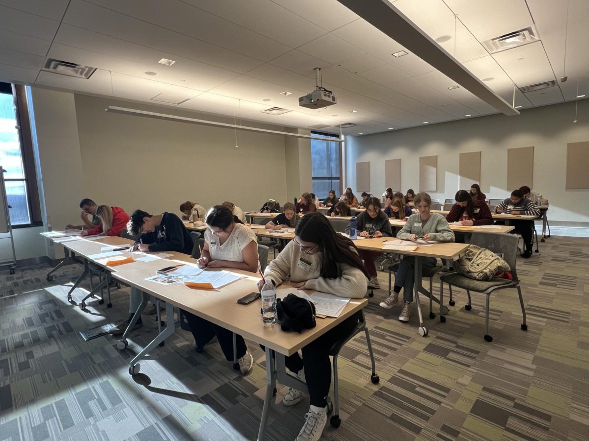 Working diligently: Print and Broadcast Media students compete against other schools on Nov. 1 at Slippery Rock University. These students attended educational sessions for journalistic enrichment.