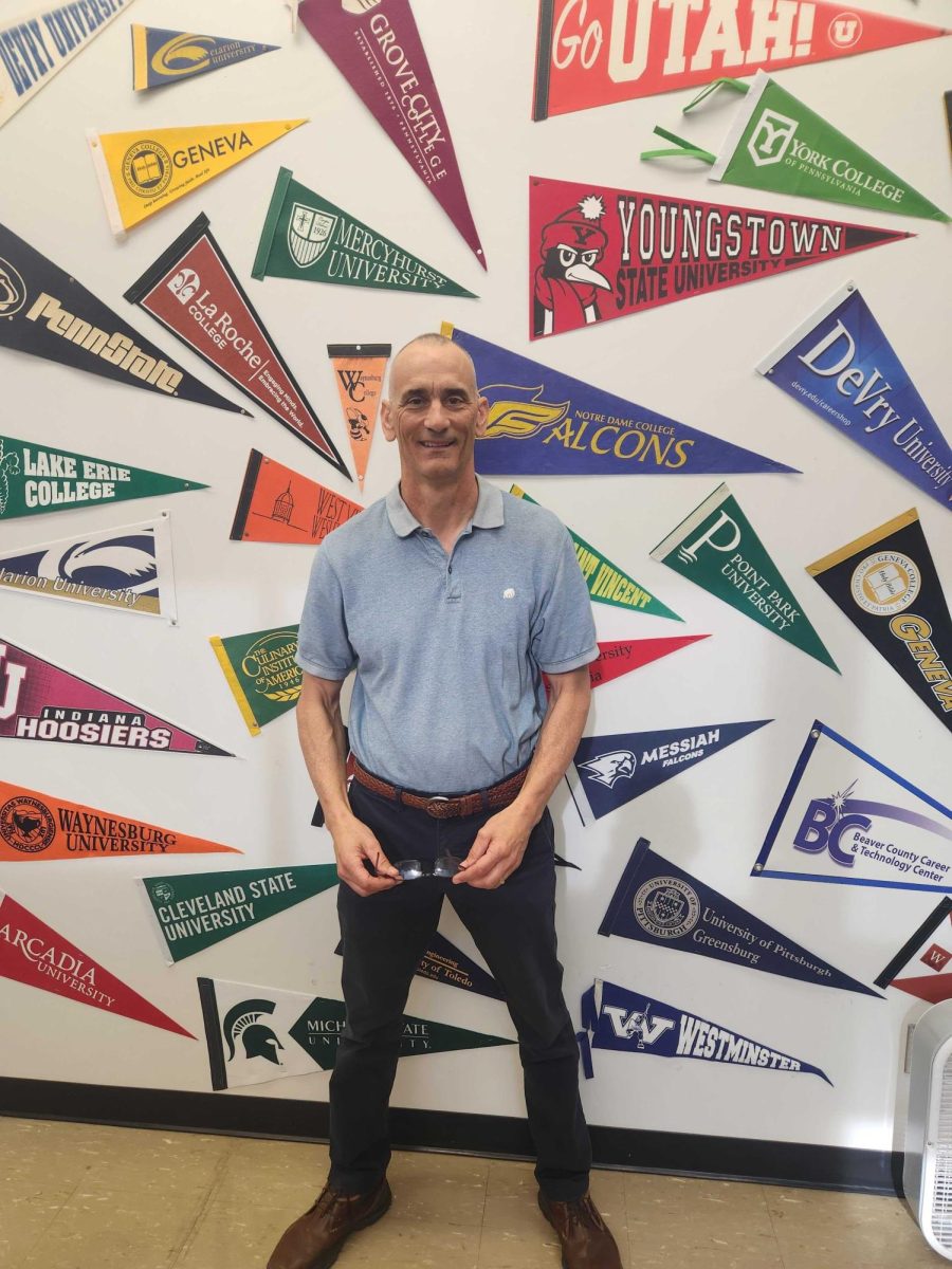 Final farewell: Mr. Bennett helped hundreds of students with their college decisions. The college flags rest along the walls of his room.