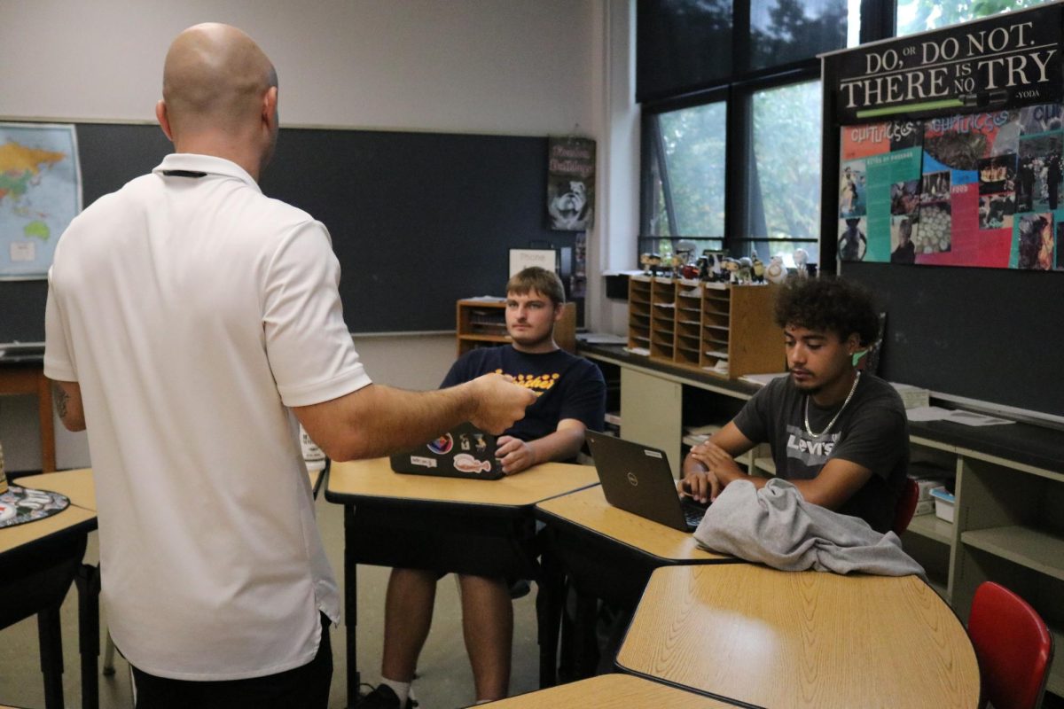 Where preparation occurs: Every Tuesday, students in Distributive Education Clubs of America (DECA) meet in Mr. Cole Eged's room. Eged loosely manages the meetings, giving students the opportunity to practice role-plays with each other or their teammates.