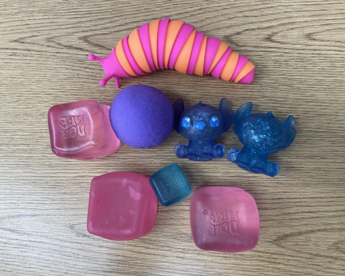 Colorful companions: Colorful assortments of NeeDohs are common to see on the desks of students. During school, students are able to concentrate easier with the help of their fidget toys, enjoying their various textures and colors. 